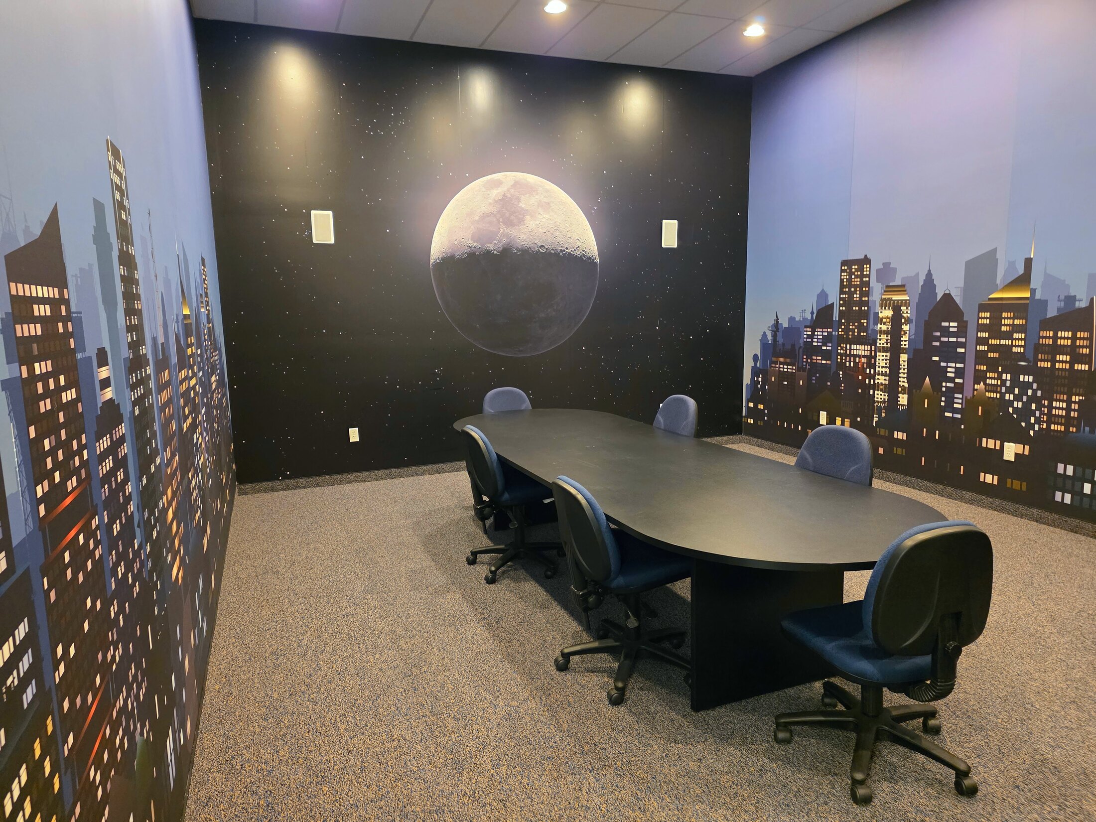 City skyline wall mural installed in a conference room